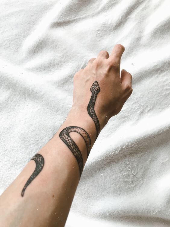 20 Simple Snake Tattoo Ideas Petpress Snake Tattoo Design Snake