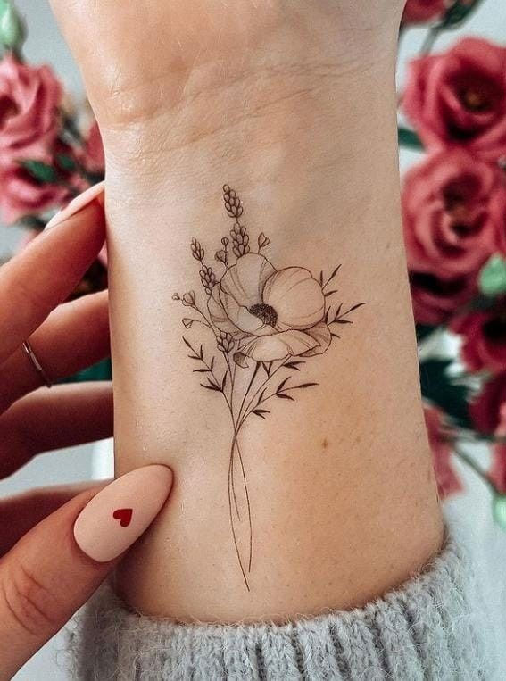 30 Beautiful Flower Tattoo Ideas Meaningful Flower Spine Tattoo I