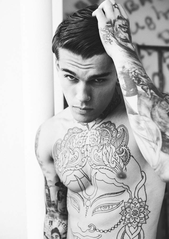 45 Intriguing Chest Tattoos For Men