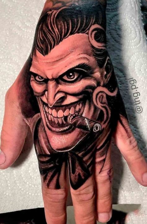 65 Best Joker Smile Hand Tattoo Ideas Tidy Tale Joker Tattoo Design