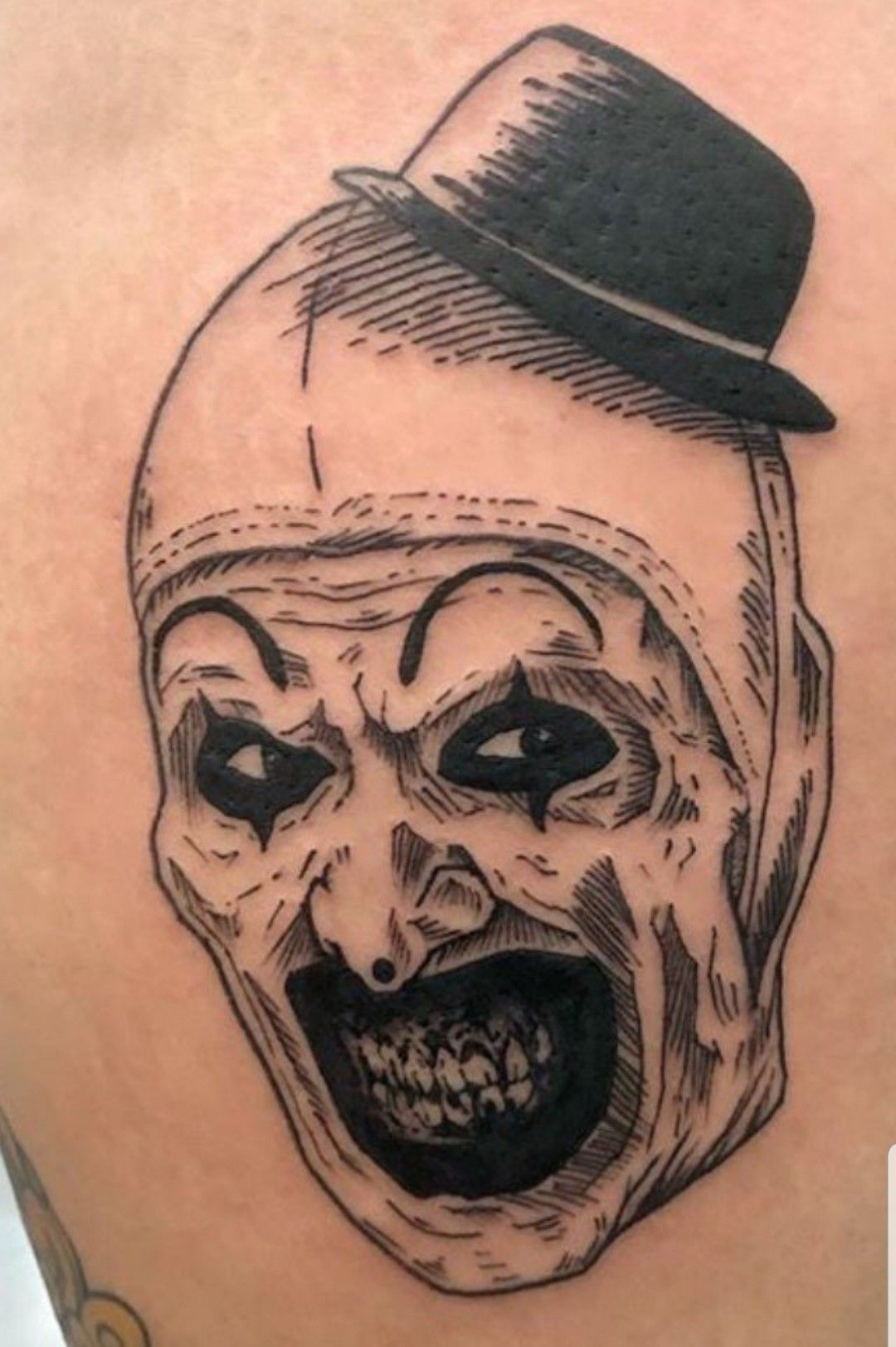 Art the Clown Tattoo: Horror Ink Inspiration