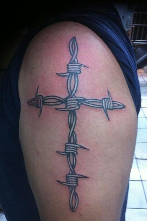 5 Symbolisms of the Barbed Wire Cross Tattoo