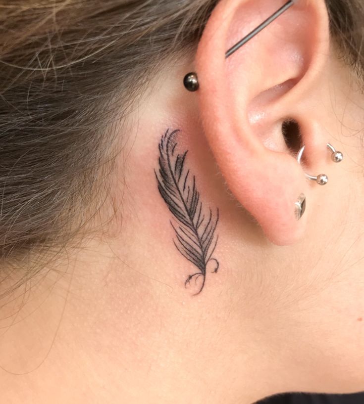 7 Stunning Behind Ear Feather Tattoo Designs