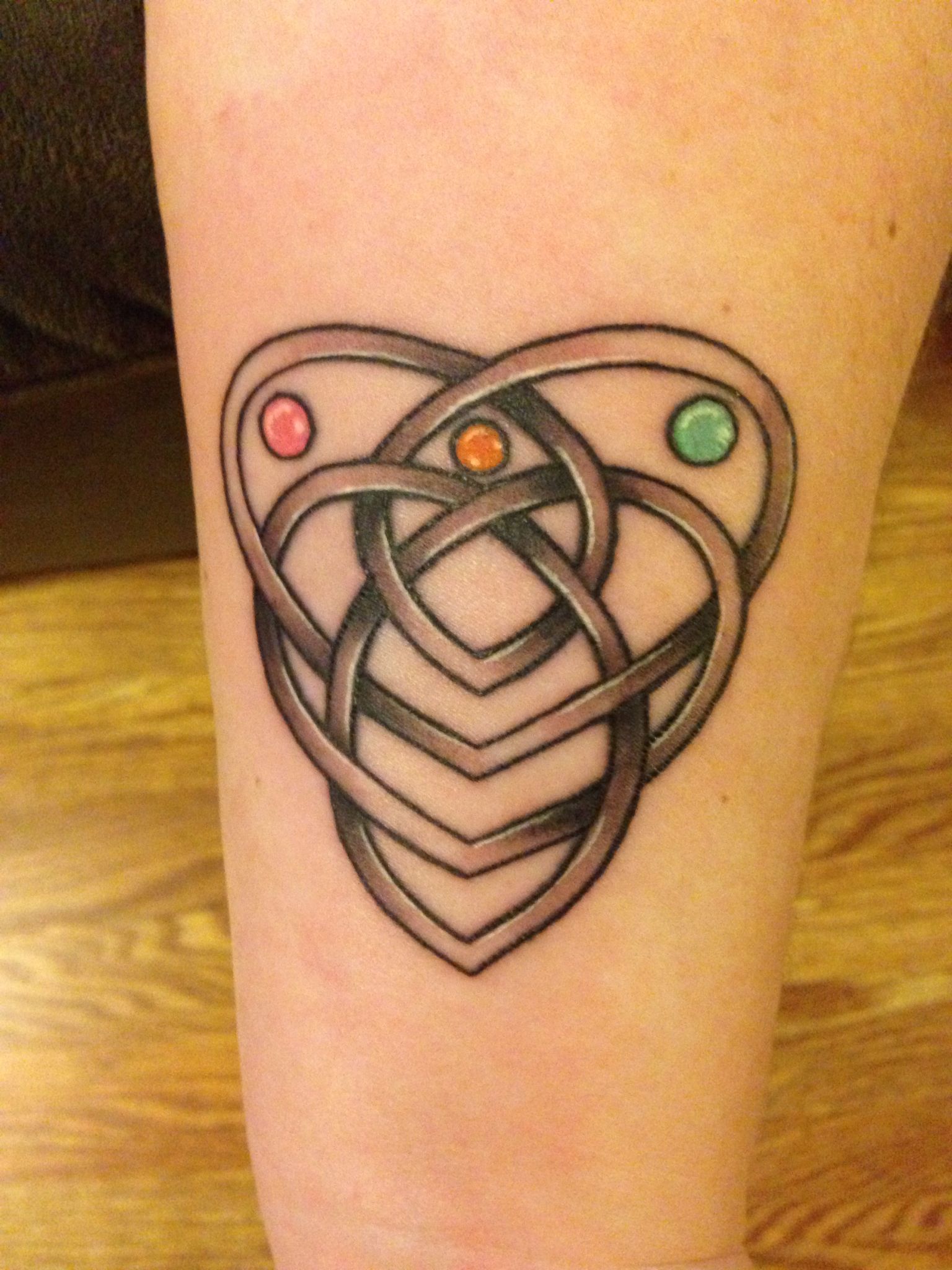 Celtic Motherhood Knot Tattoo With Lilies Of The Valley Colors