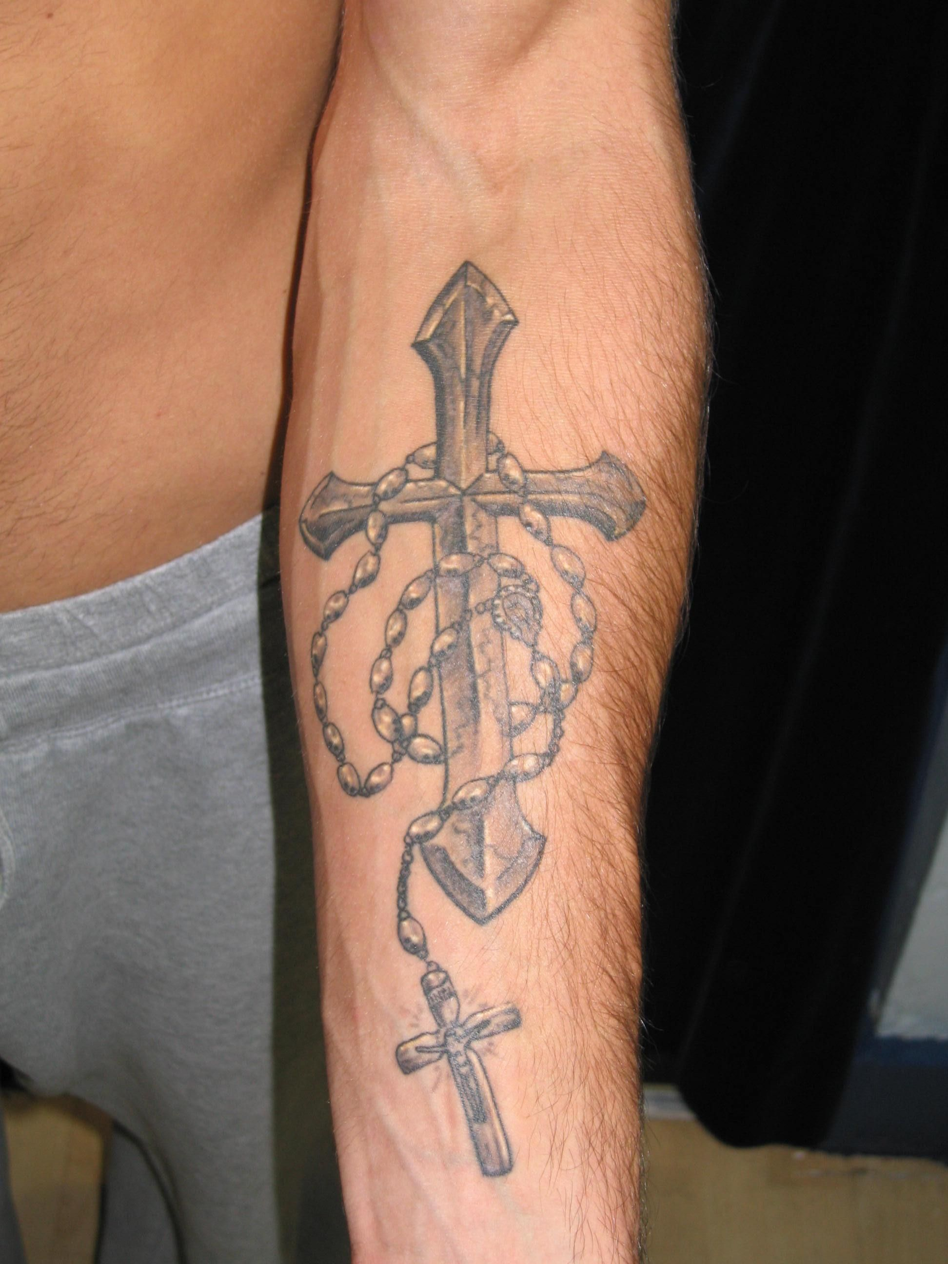 5 Stunning Cross Tattoo Designs For Your Arm