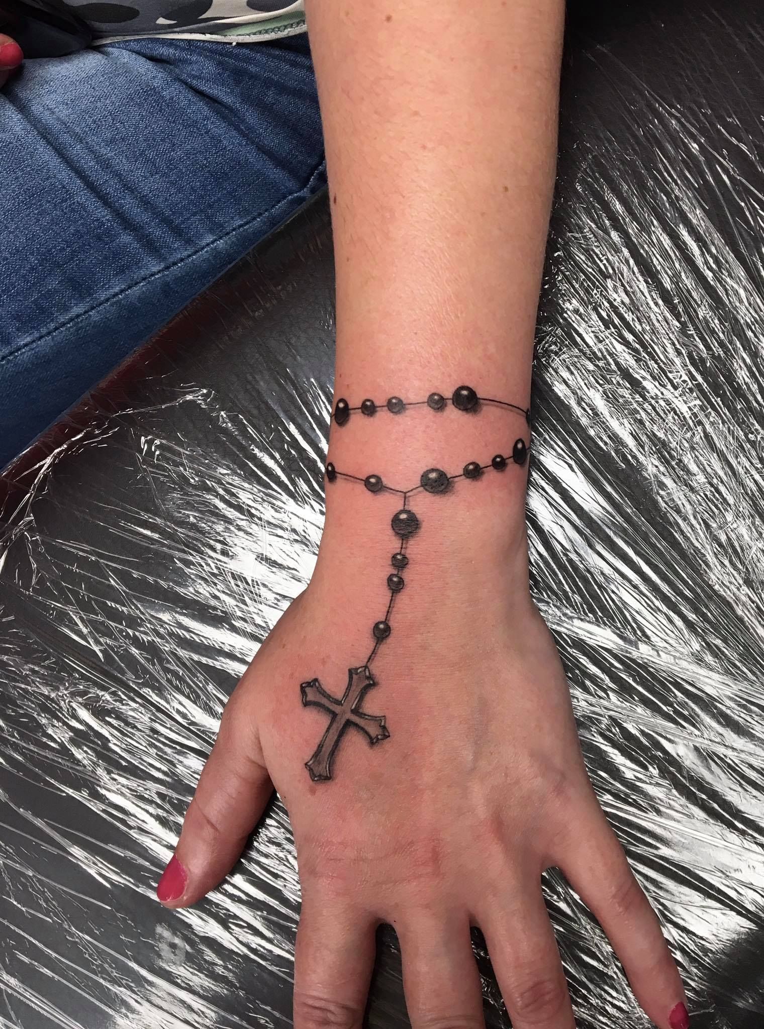 Elegant Female Rosary Hand Tattoo Ideas for Inspiration