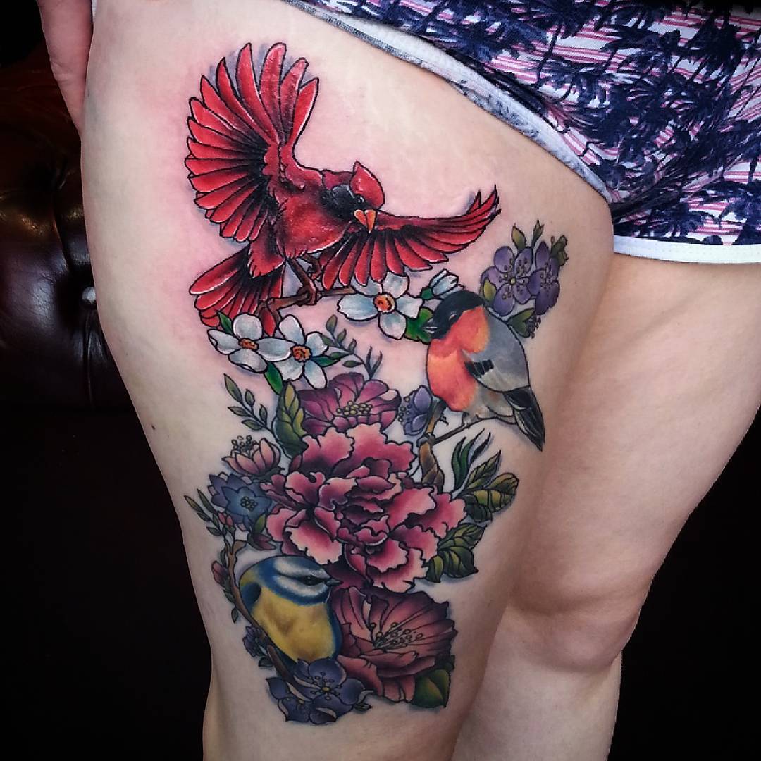 5 Stunning Female Thigh Tattoo Designs for Inspiration