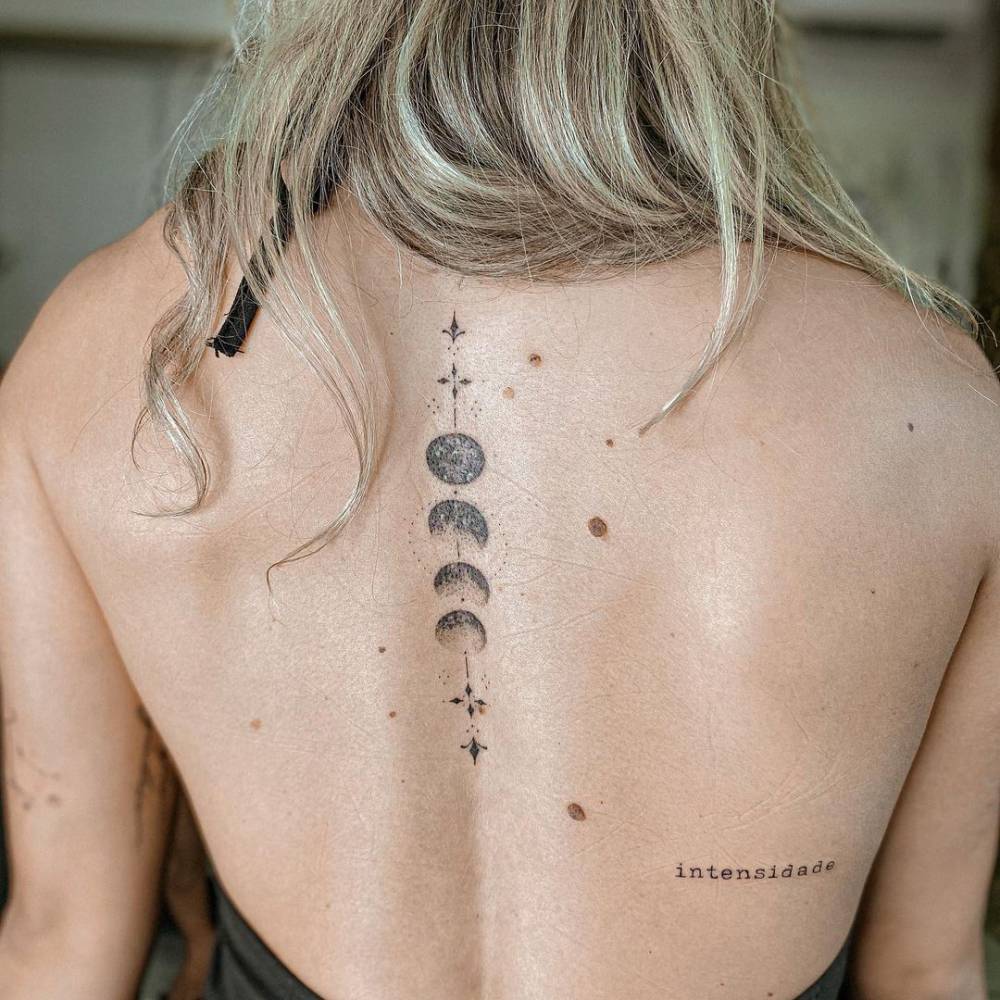 Fine Line Moon Phases Tattoo On The Back Moon Phases Tattoo Spine Tattoos For Women Spine