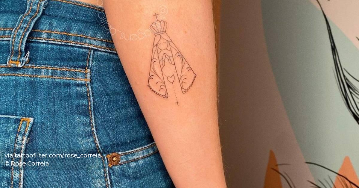 Fine Line Style Virgin Mary Tattoo Located On The