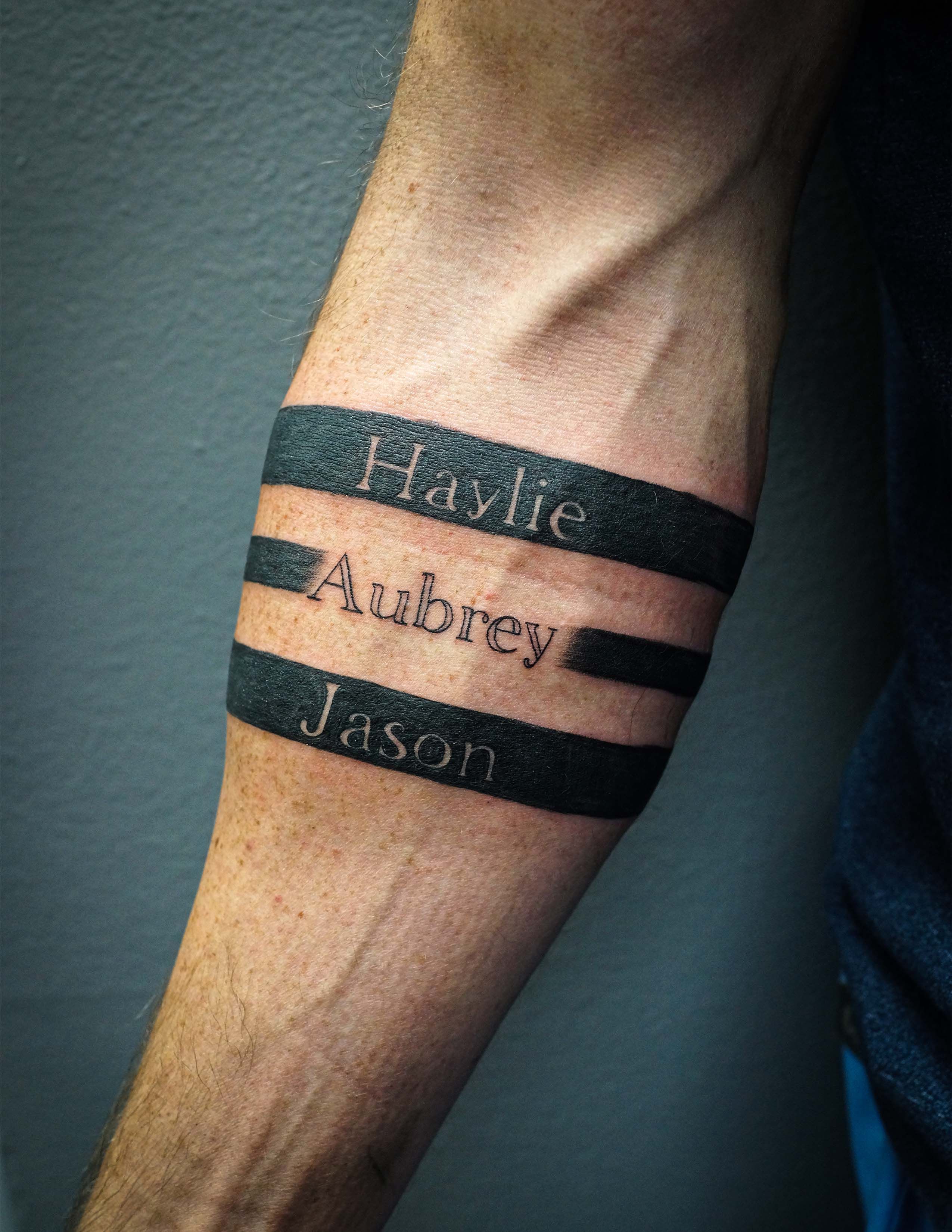 15 Cool Forearm Band Tattoo Ideas for Men