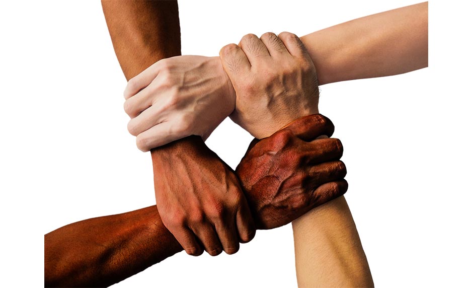 Four People Holding Hands With Tattoos On Their Arms