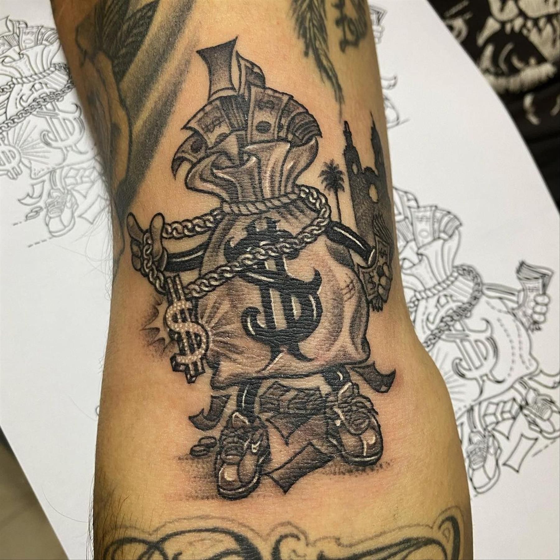 5 Meanings Behind Gangster Money Bag Tattoos