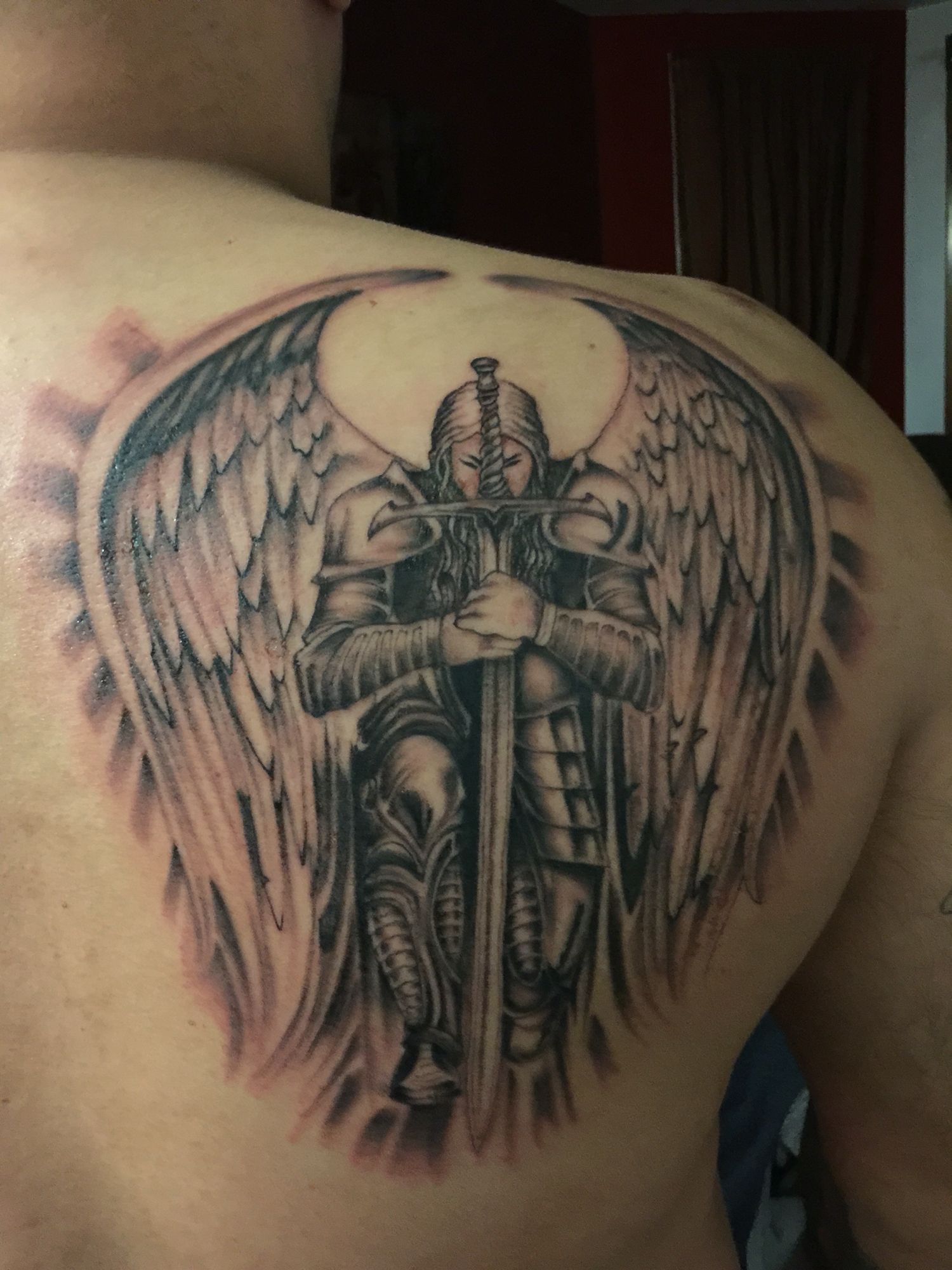 7 Stunning Guardian Angel Tattoo Designs You'll Love