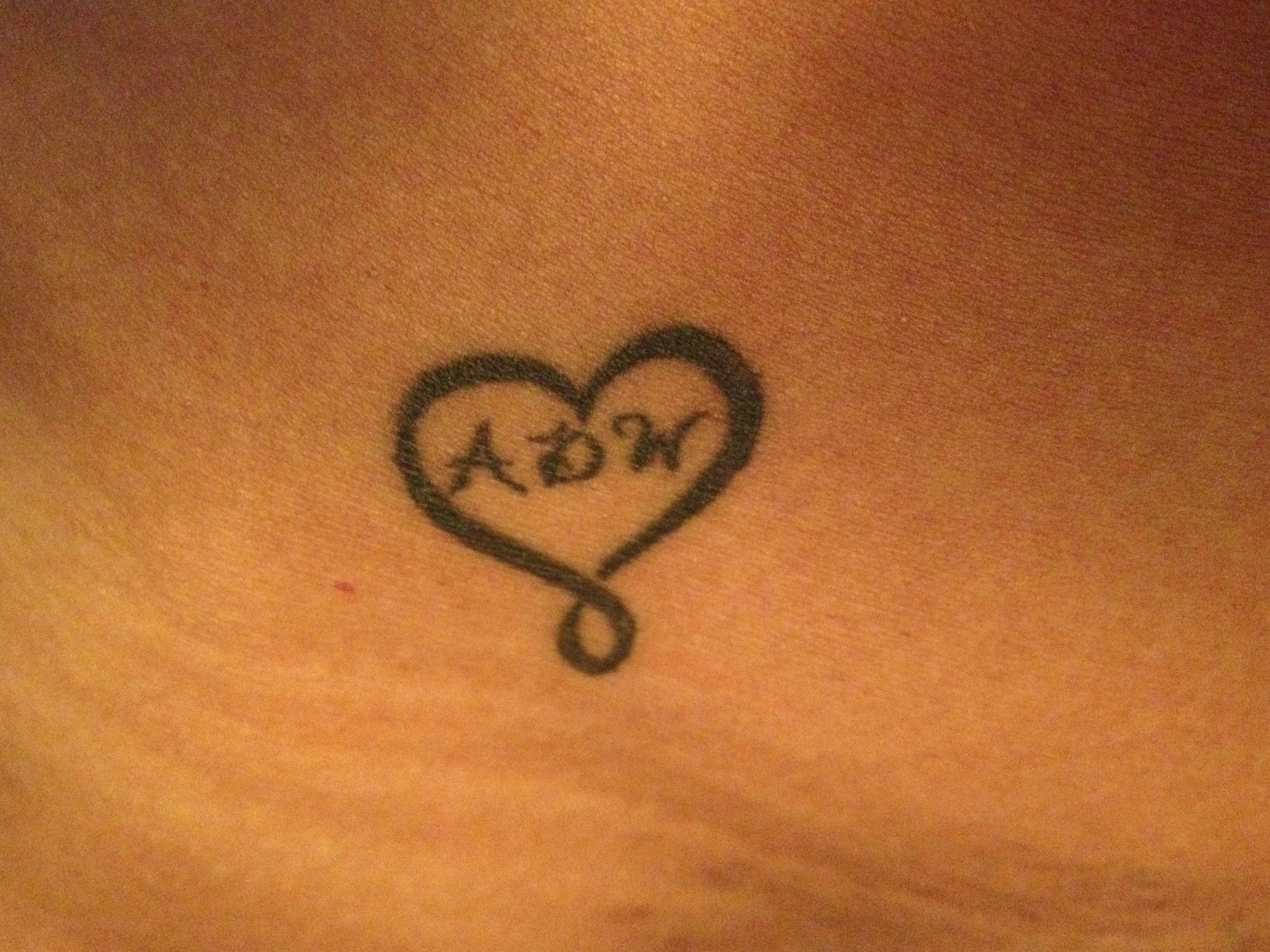 Heart with Initials Tattoo: Personalized Love Ink