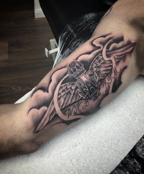 7 Stylish Inner Bicep Tattoo Ideas for Men