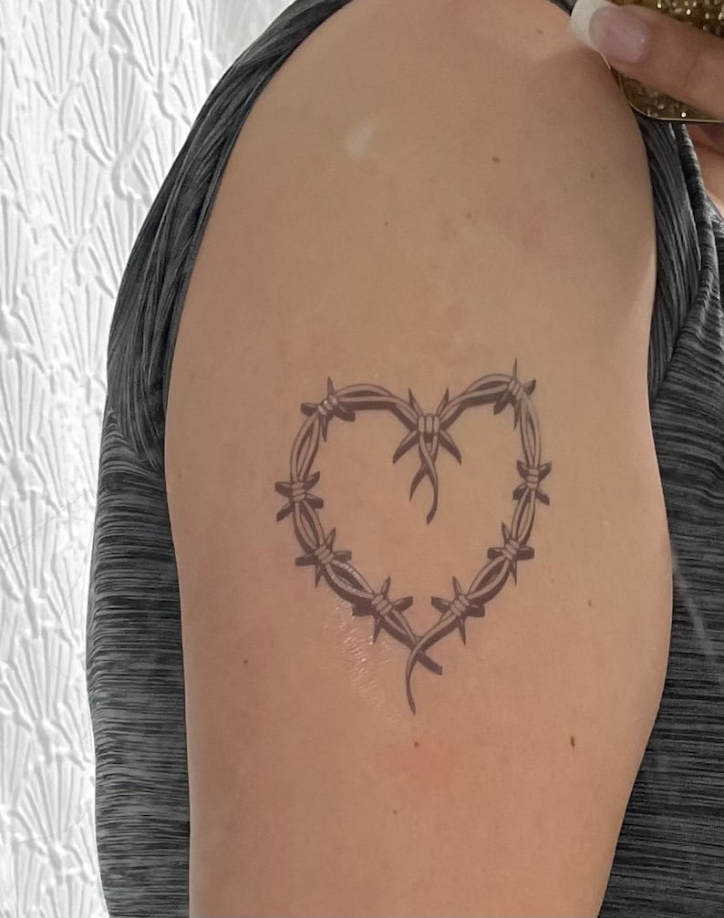 5 Ways Karol G's Tattoo Heart Will Inspire Your Ink