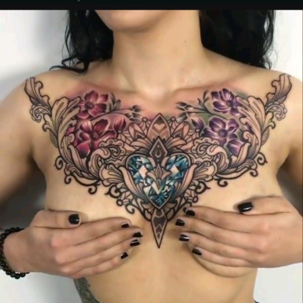 10 Stunning Ladies Chest Piece Tattoo Ideas