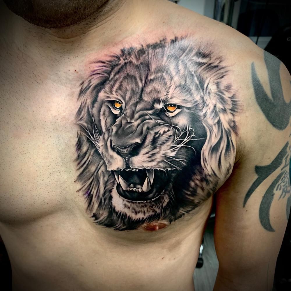 Roar Your Strength: Best Lion Tattoos for Chest