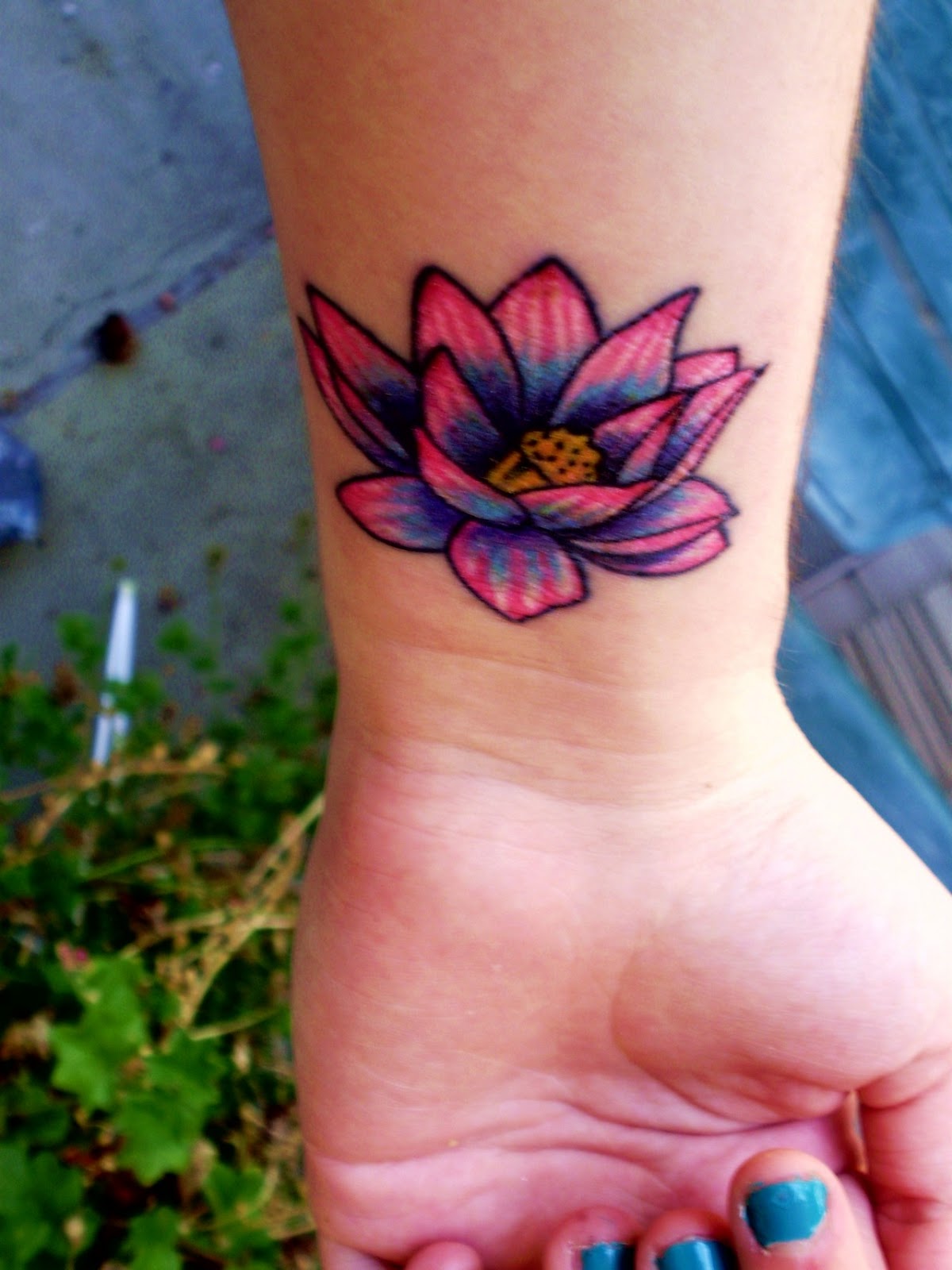 Lotus Flower Tattoos On Wrist