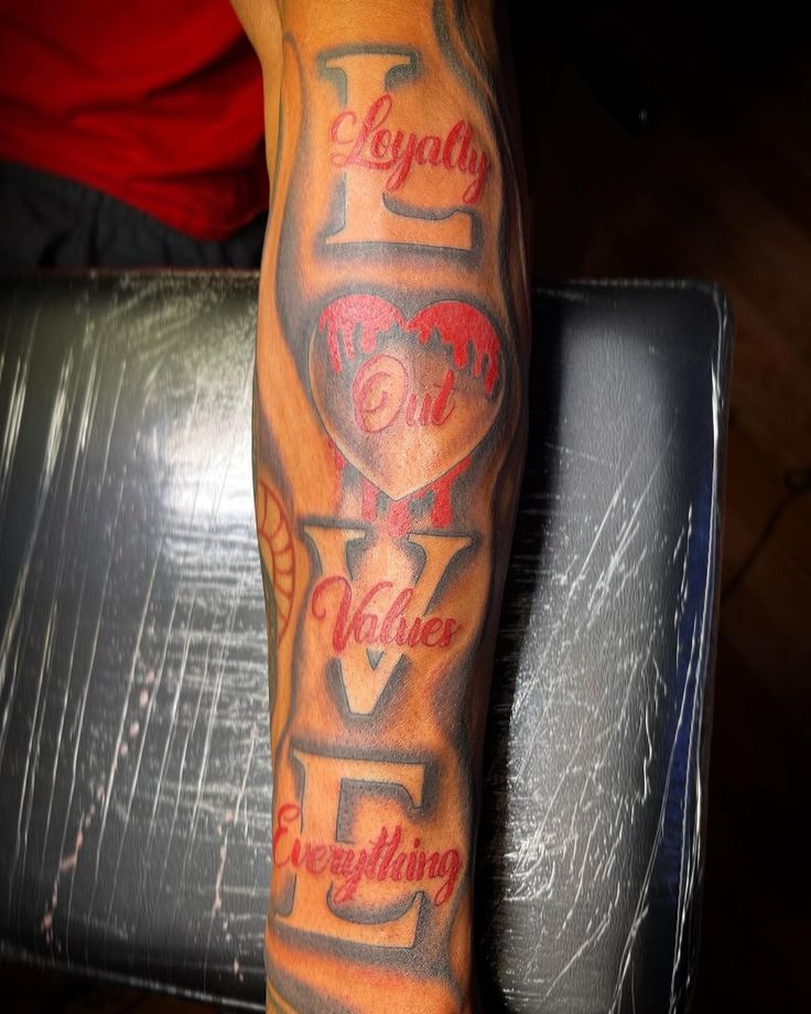 Loyalty Out Values Everything Forearm Tattoo