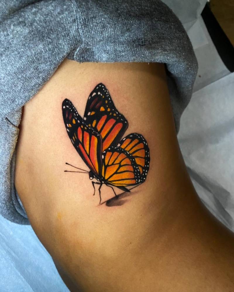 Monarch Butterfly Tattooed On The Rib Illustrative