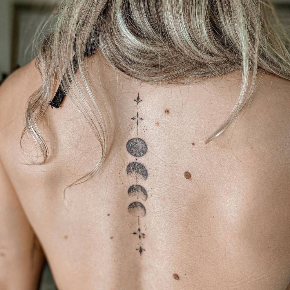 5 Stunning Moon Phases Spine Tattoo Ideas