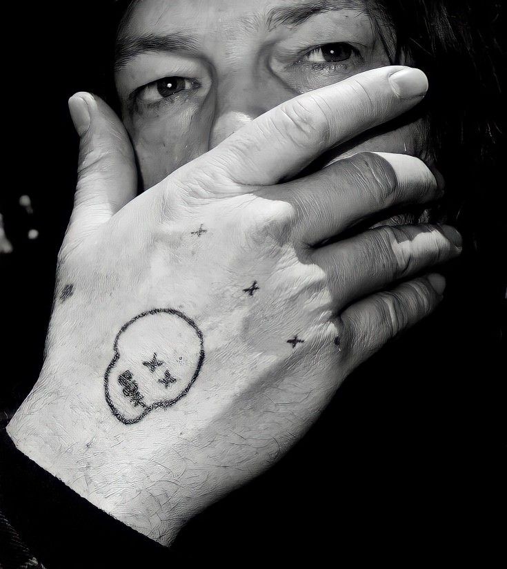 Norman Reedus Tattoos Meaning