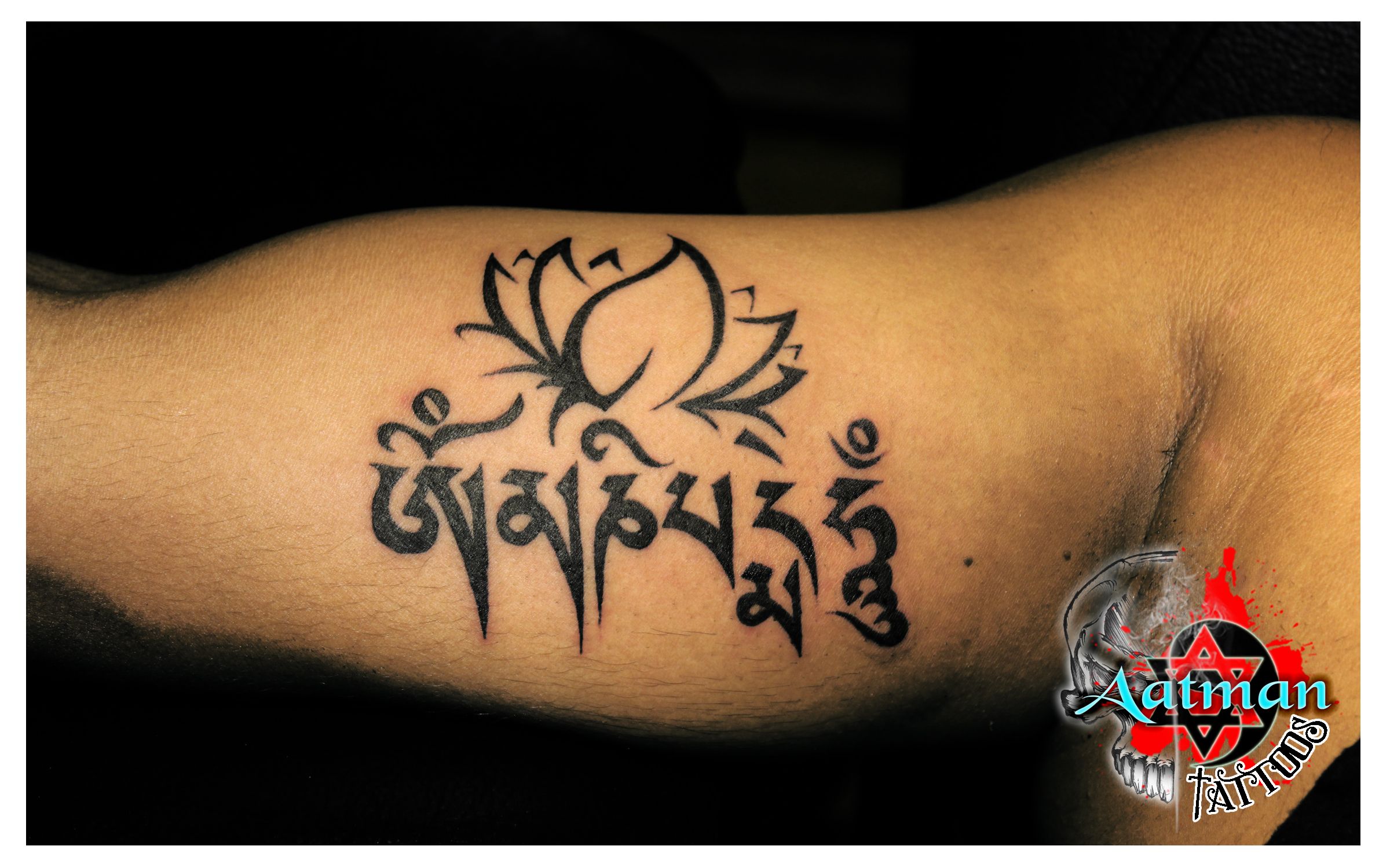 Om Mani Padme Hum Lettering Tattoo Located On The