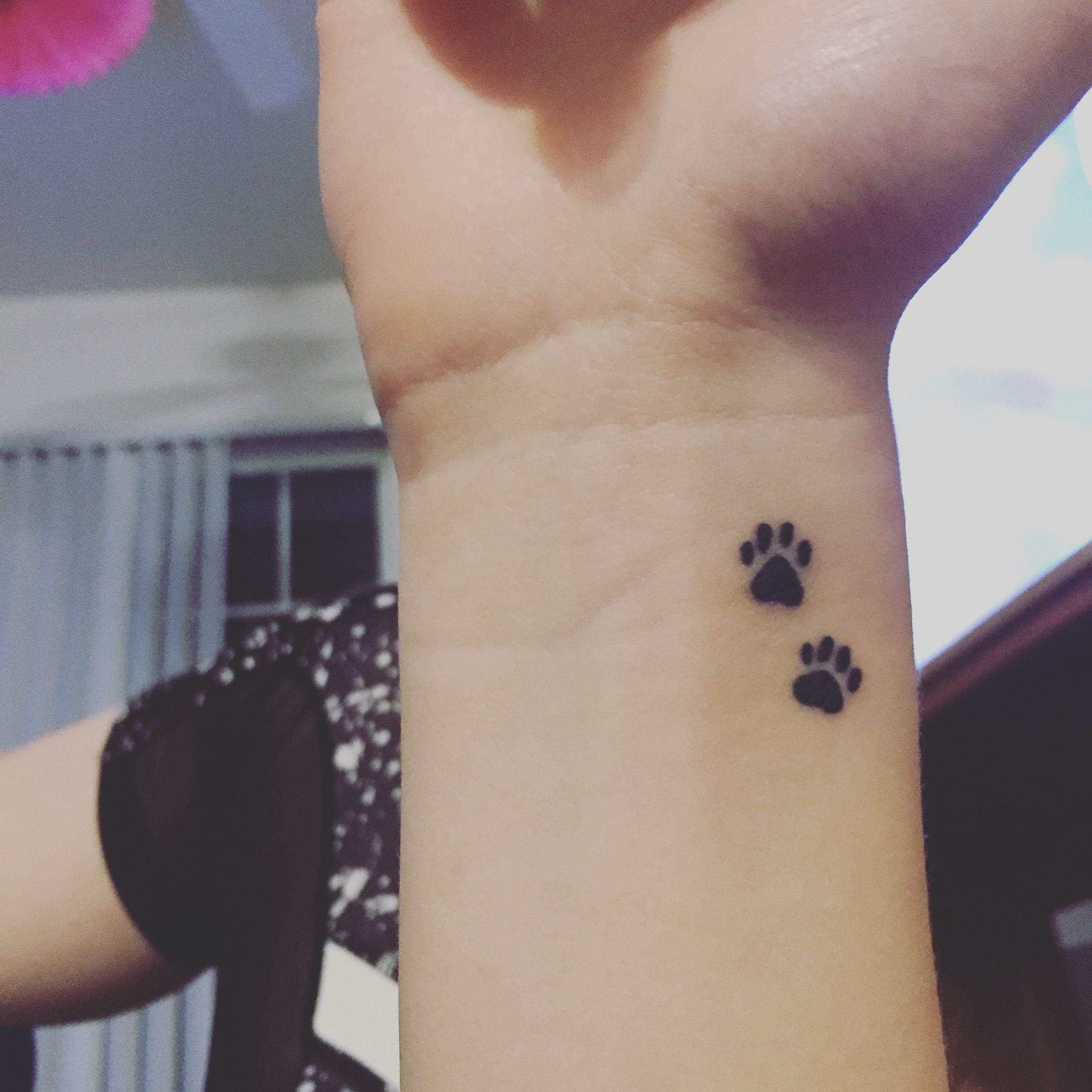 Small Paw Print Tattoo Ideas for Pet Lovers