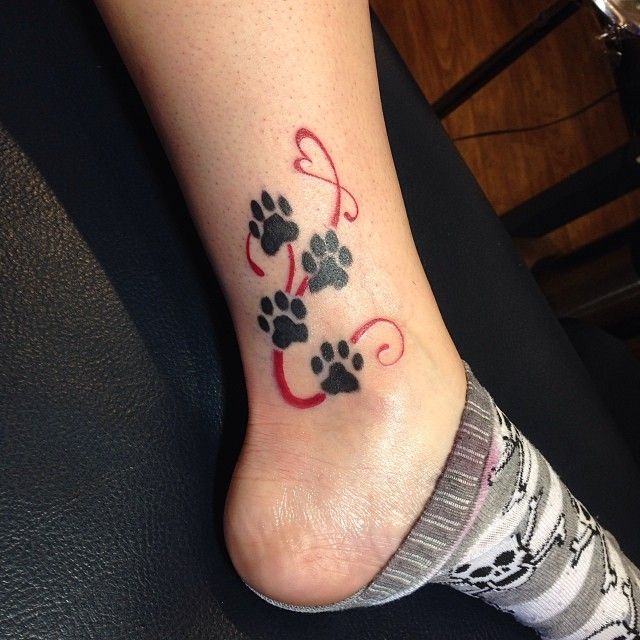 Paw Print Trail Tattoo On Back