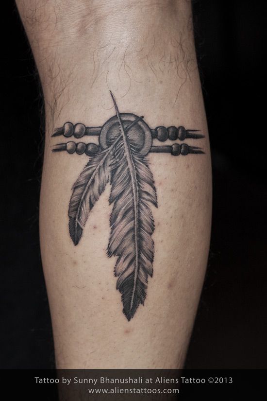 Red Indian Feather Tattoo Inked By Sunny At Aliens Tattoo Mumbai