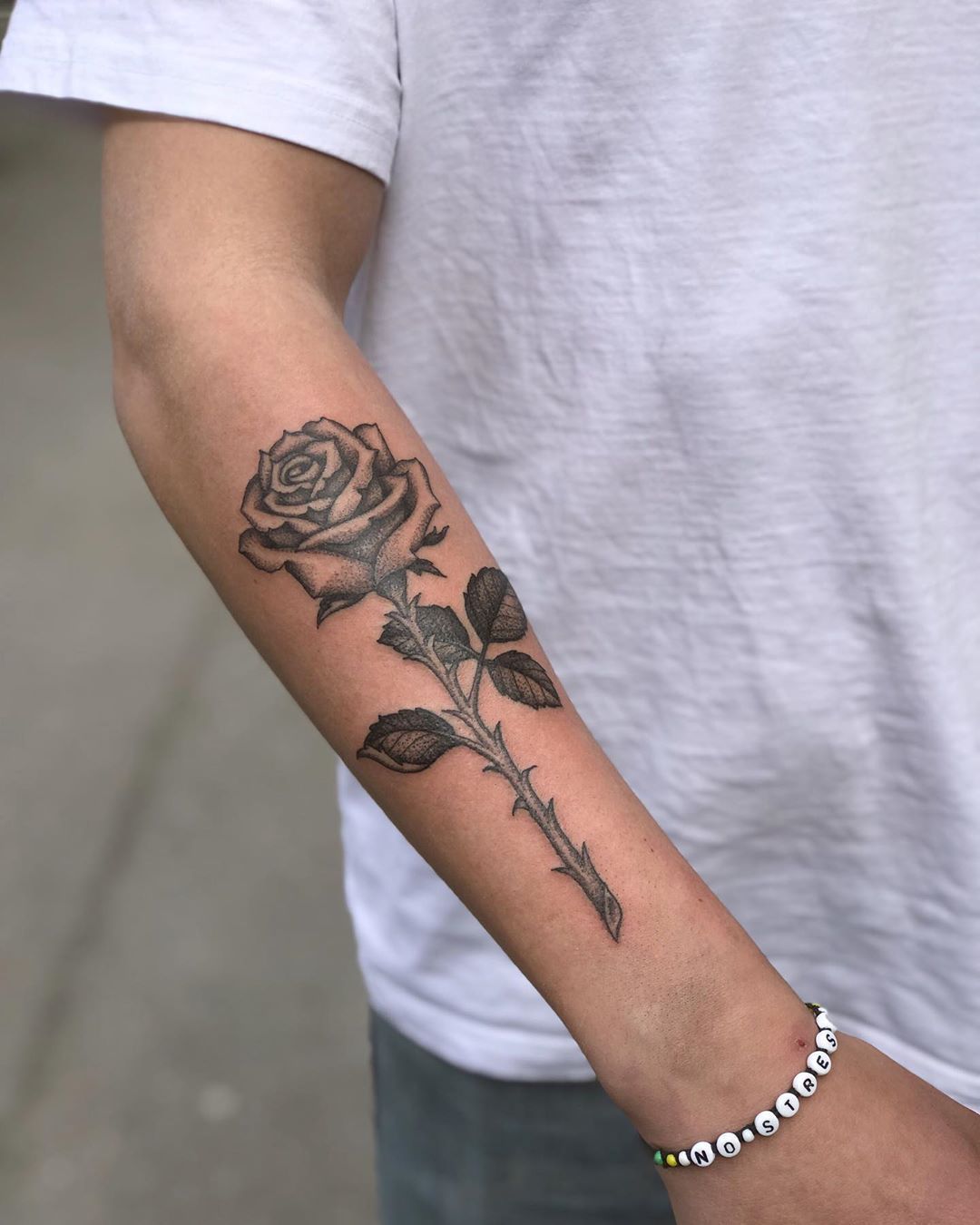 50 Striking Rose Forearm Tattoo Designs for Men