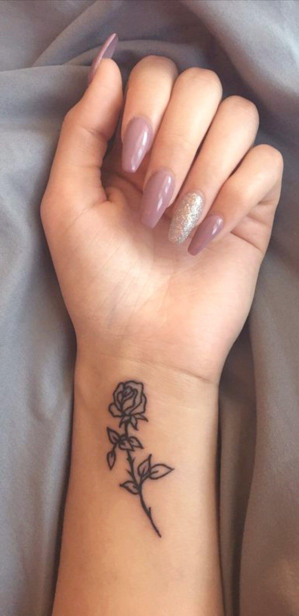 Rose on Wrist Tattoo: Symbolic Beauty Unveiled