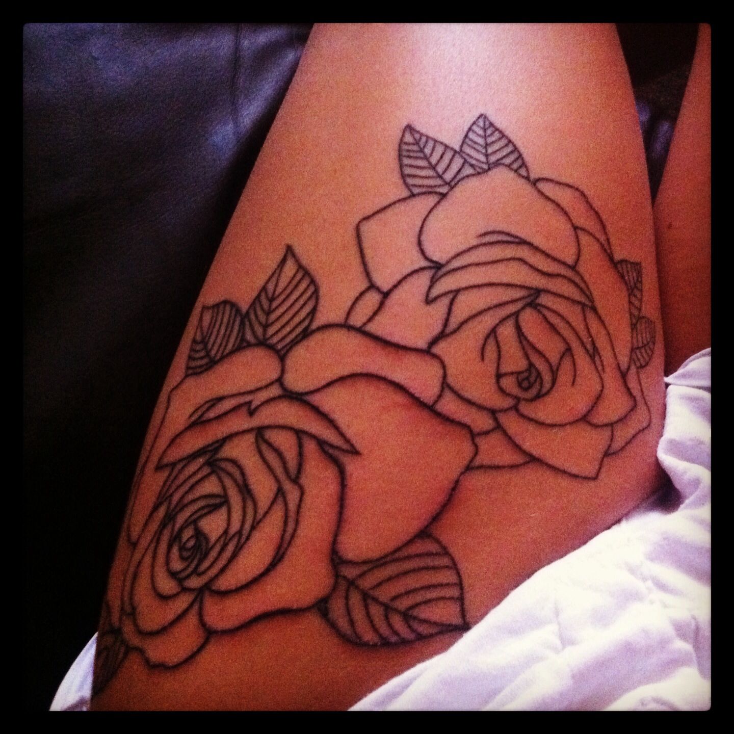 Elegant Rose Thigh Tattoos for Modern Women