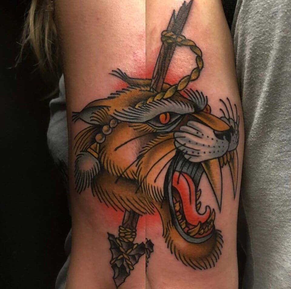 5 Stunning Saber Tooth Tiger Tattoo Designs for 2023