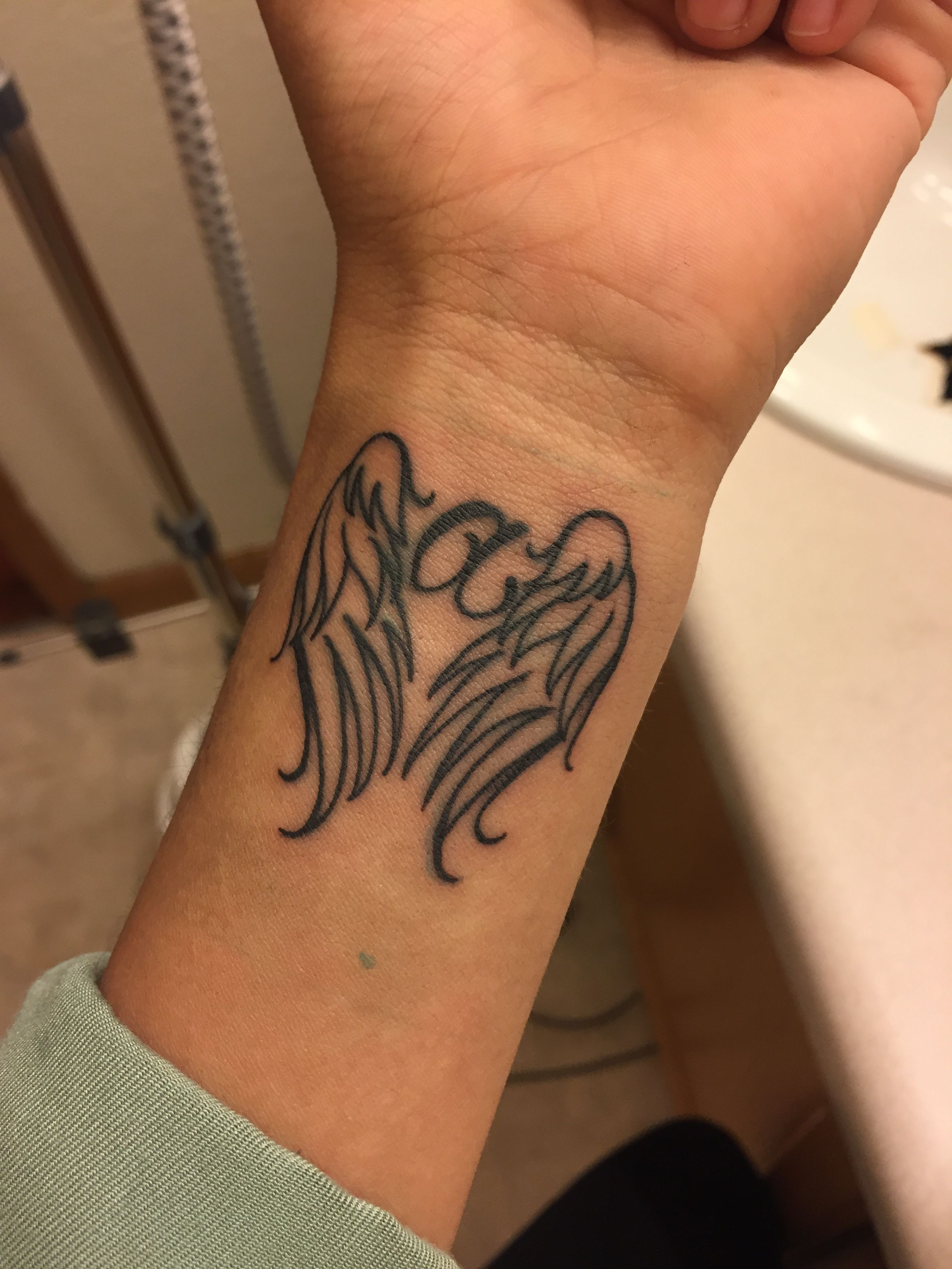 Simple Wing Tattoo Designs For Girls On Back