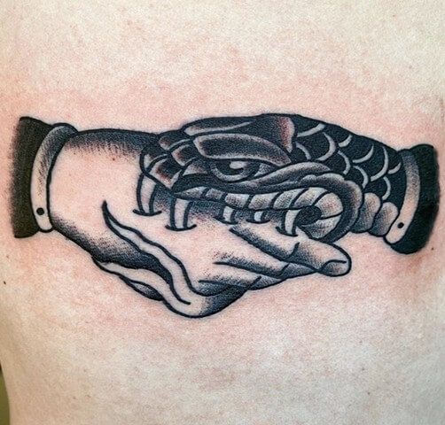 Snake Bites Hand Tattoo: Meaning and Designs