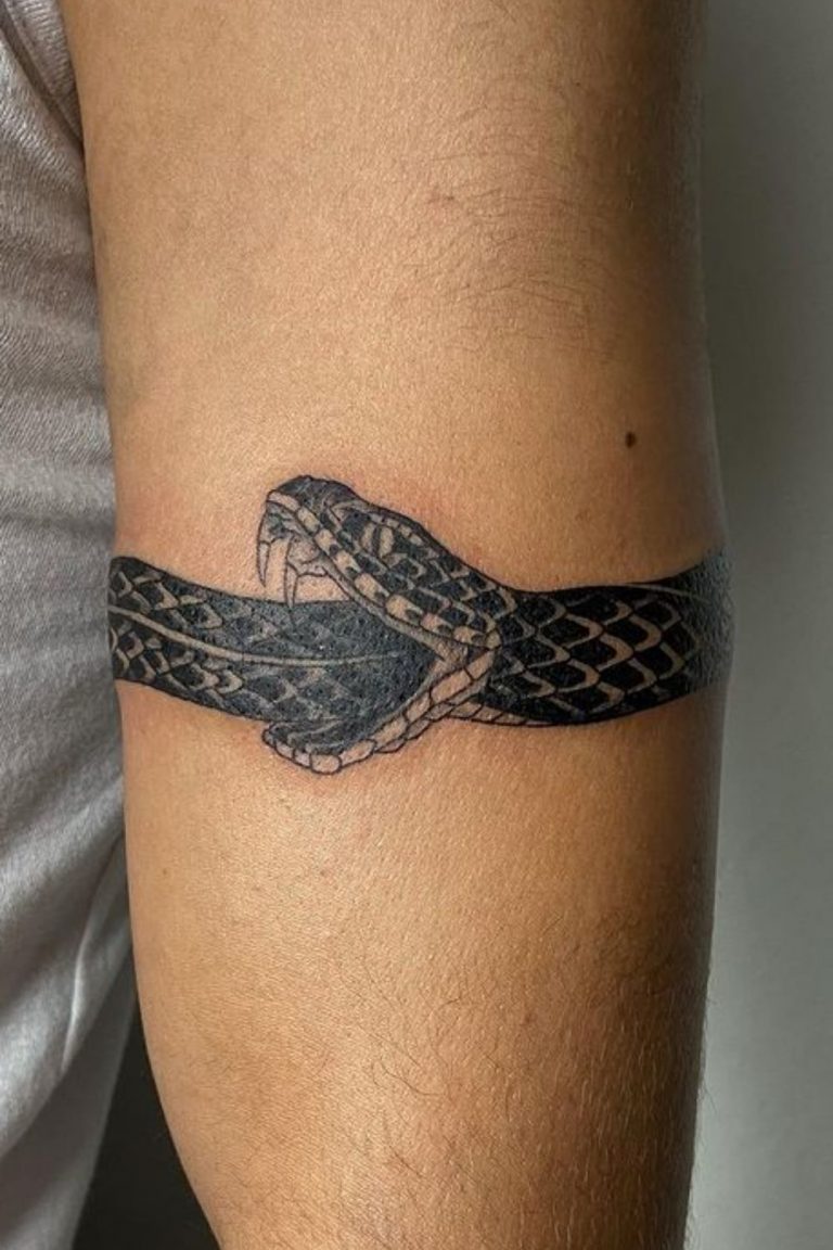 5 Symbolic Meanings Behind Snake Eating Itself Tattoos