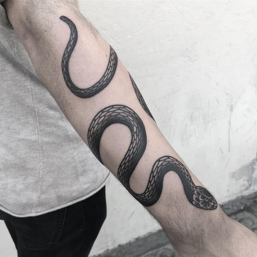 Snake Tattoo Around Arm: A Striking Style Statement