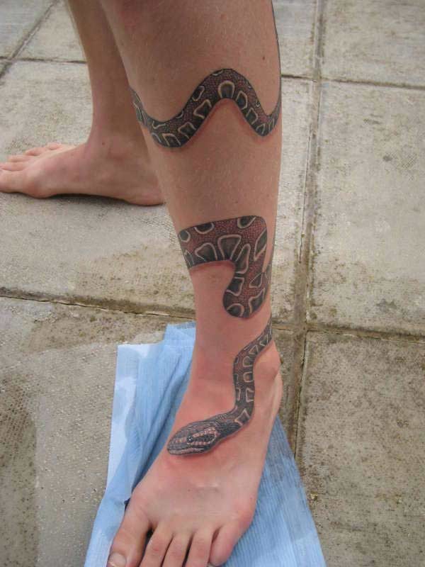 Snake Tattoo Wrapped Around Leg: Meaning and Design Tips