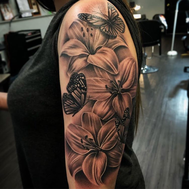 Elegant Lily and Butterfly Tattoo Designs for Inspiration