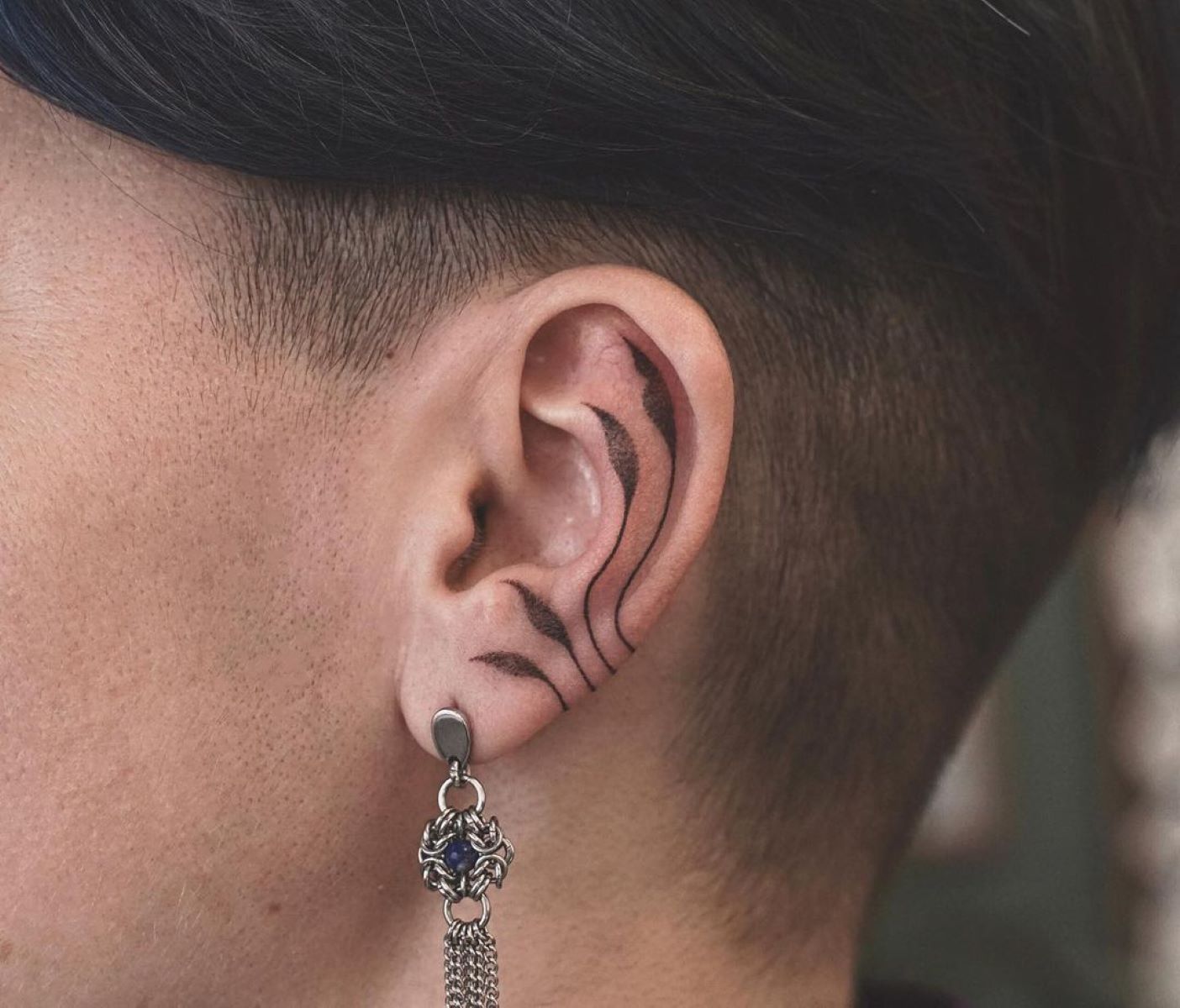 The Hidden Meaning Behind Ear Tattoos Revealed Regretless