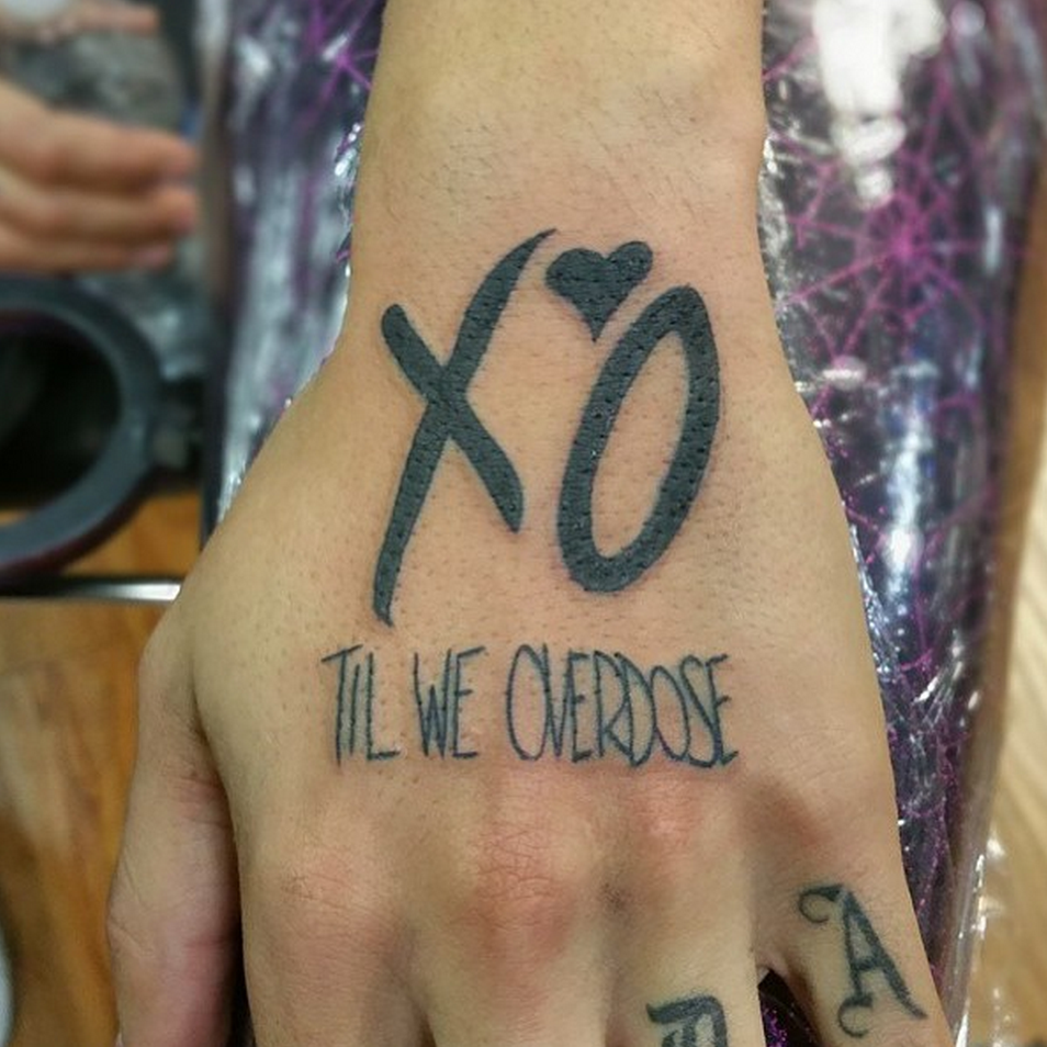 The Weeknd's XO Tattoo: Meaning and Mystery