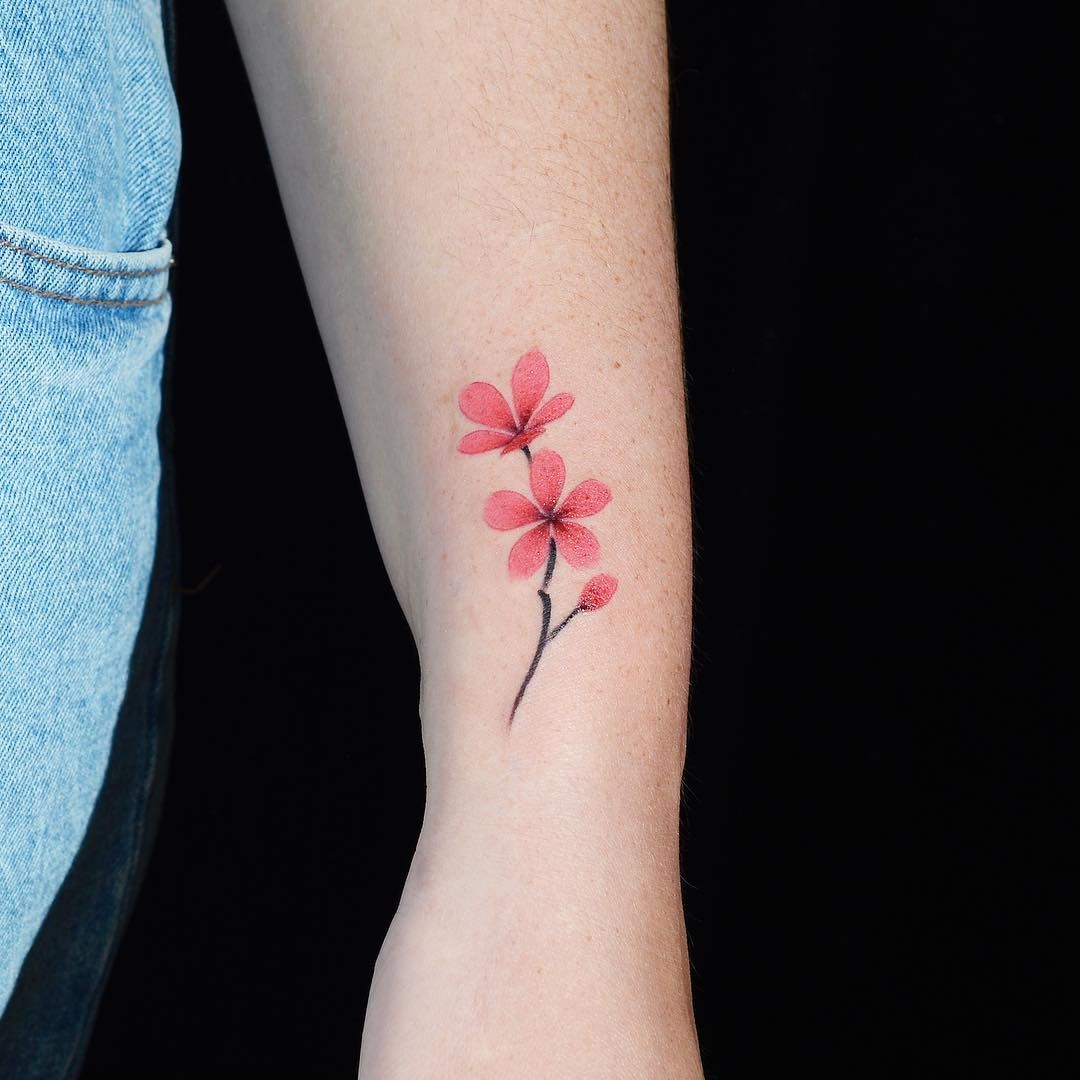 5 Ways Tiny Cherry Blossom Tattoos Exude Elegance