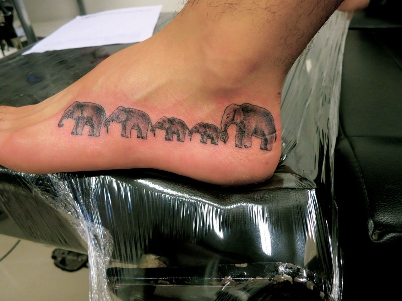 Today I Got A Tattoo Of Five Elephants Walking Together To Represent