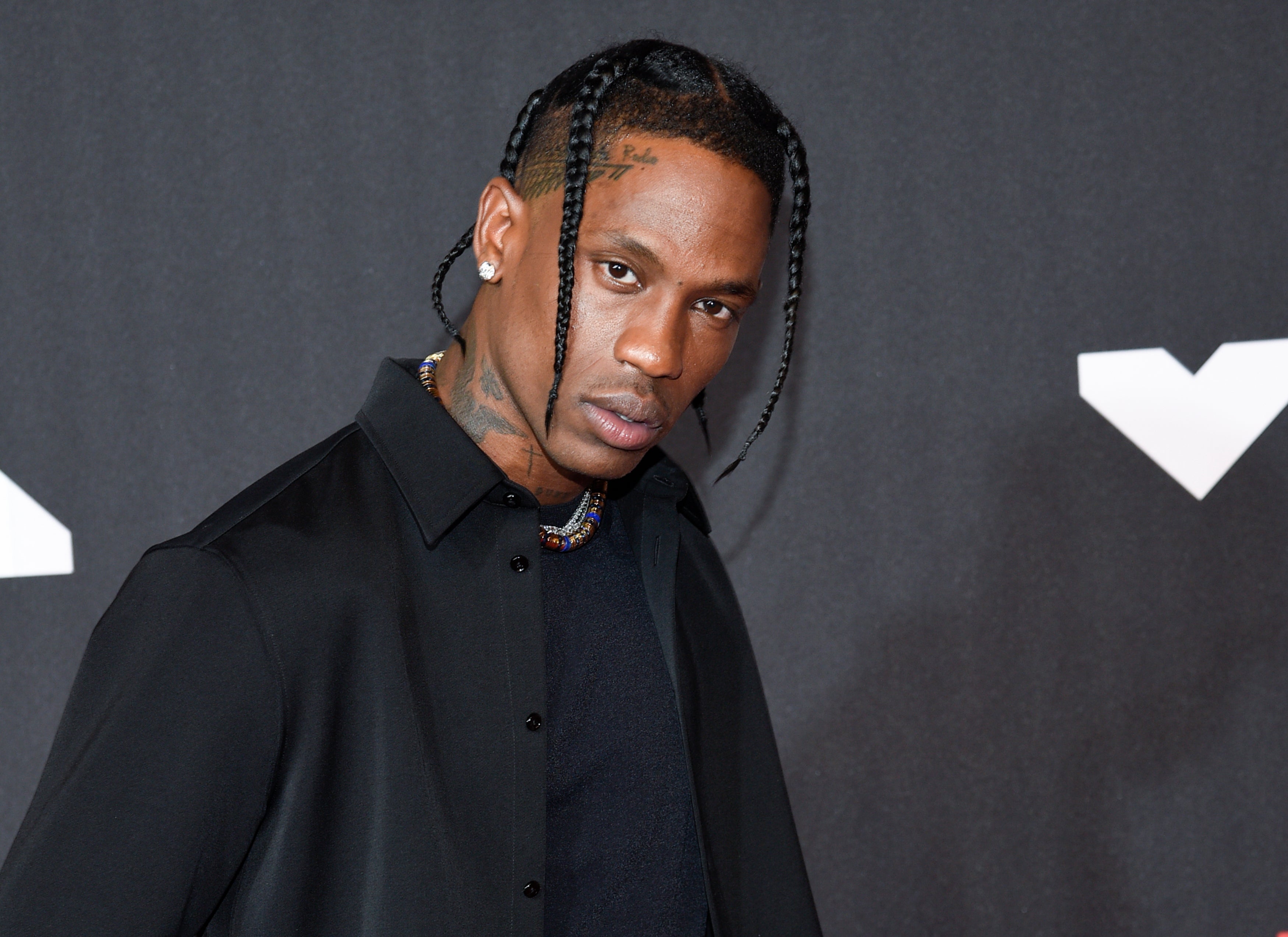 Travis Scott Gets Wrap Around Head Tattoo As He Prepares For Tour