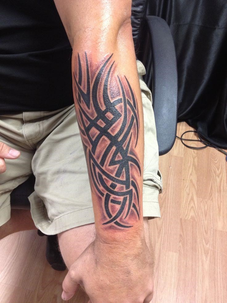 Tribal Forearm Tattoos: Bold Styles for Men