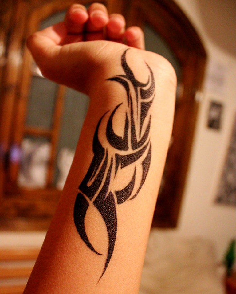 10 Stunning Tribal Wrist Tattoo Designs to Inspire You