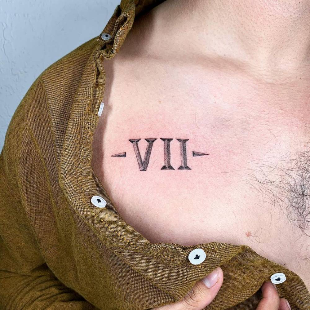 Vii Roman Numerals Tattoo On The Chest