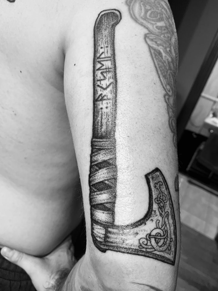 Viking Axe Tattoo: Symbolism and Significance